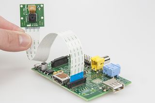 Raspberry-Pi-model-A-and-camera-bundle_LR-October 2013